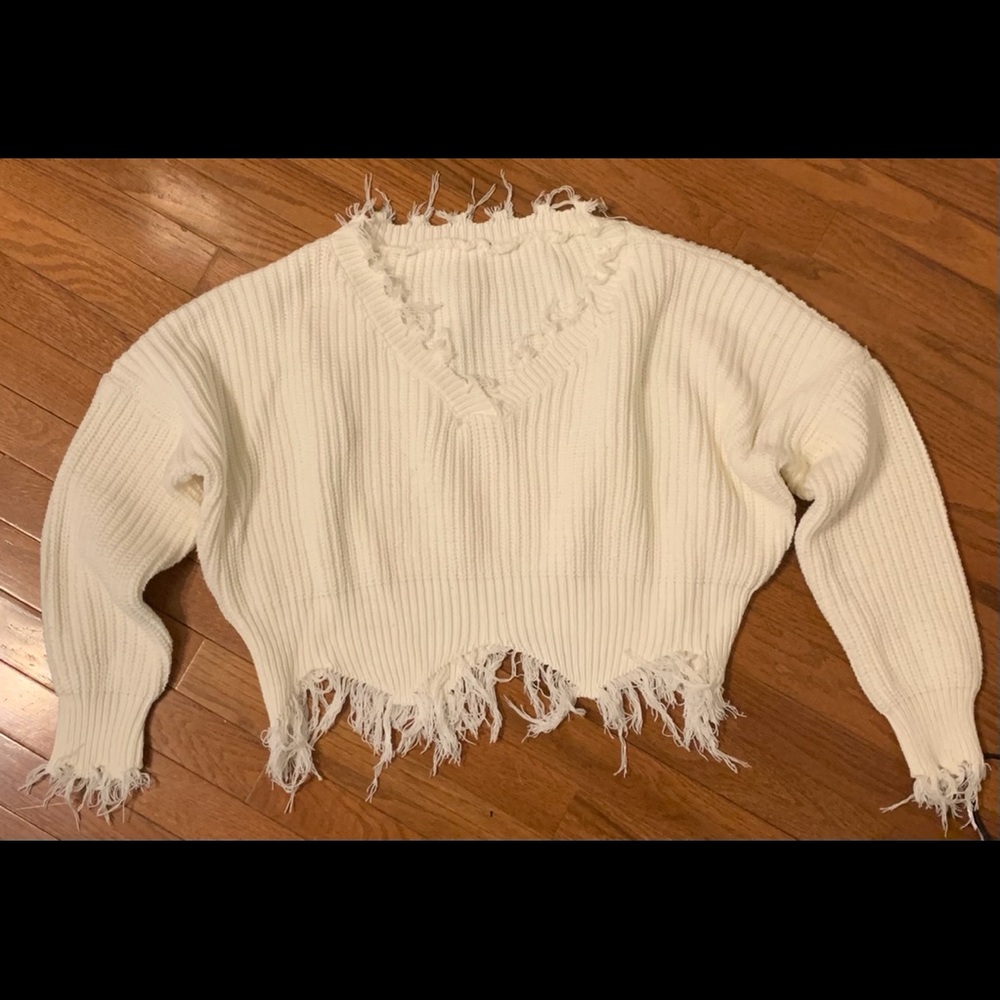 Cropped white knit sweater